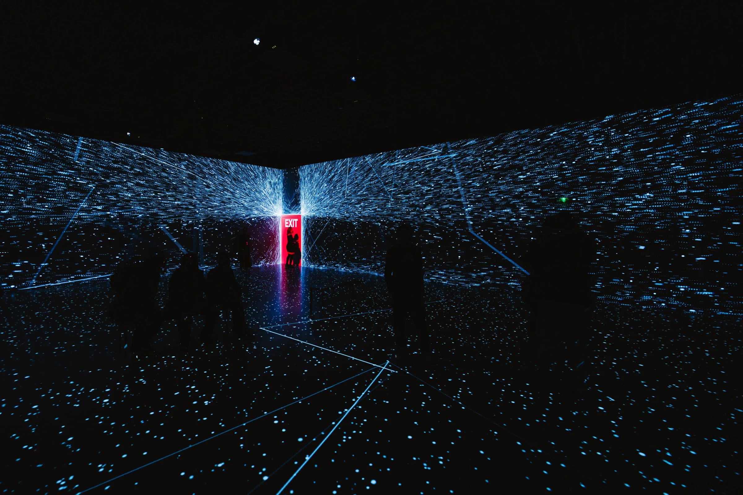 Guests at a corporate event inside the Signal Space hall
