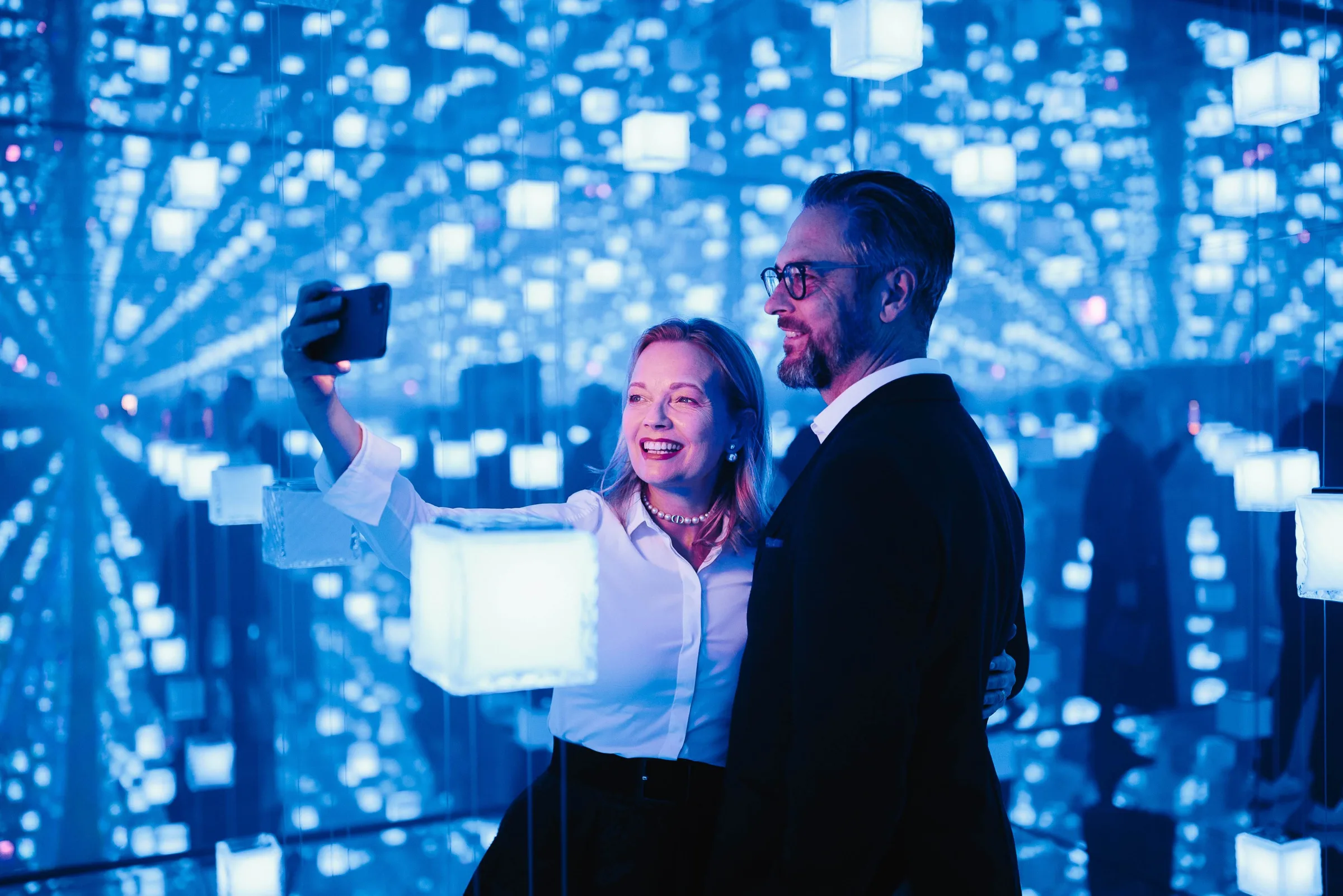 Guests gathered under the projections of the Signal Space hall